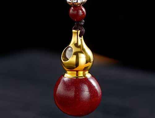 Golden Cinnabar Gourd Pendant with Sacred Mantra Projection